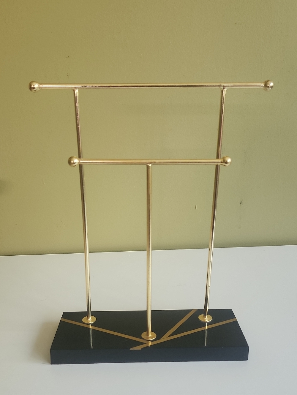 Gold Metal Jewelry Display Stand with Black Base